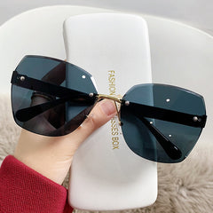 Fashion rimless cut edge sunglasses two-color gradient large frame windproof driving glasses